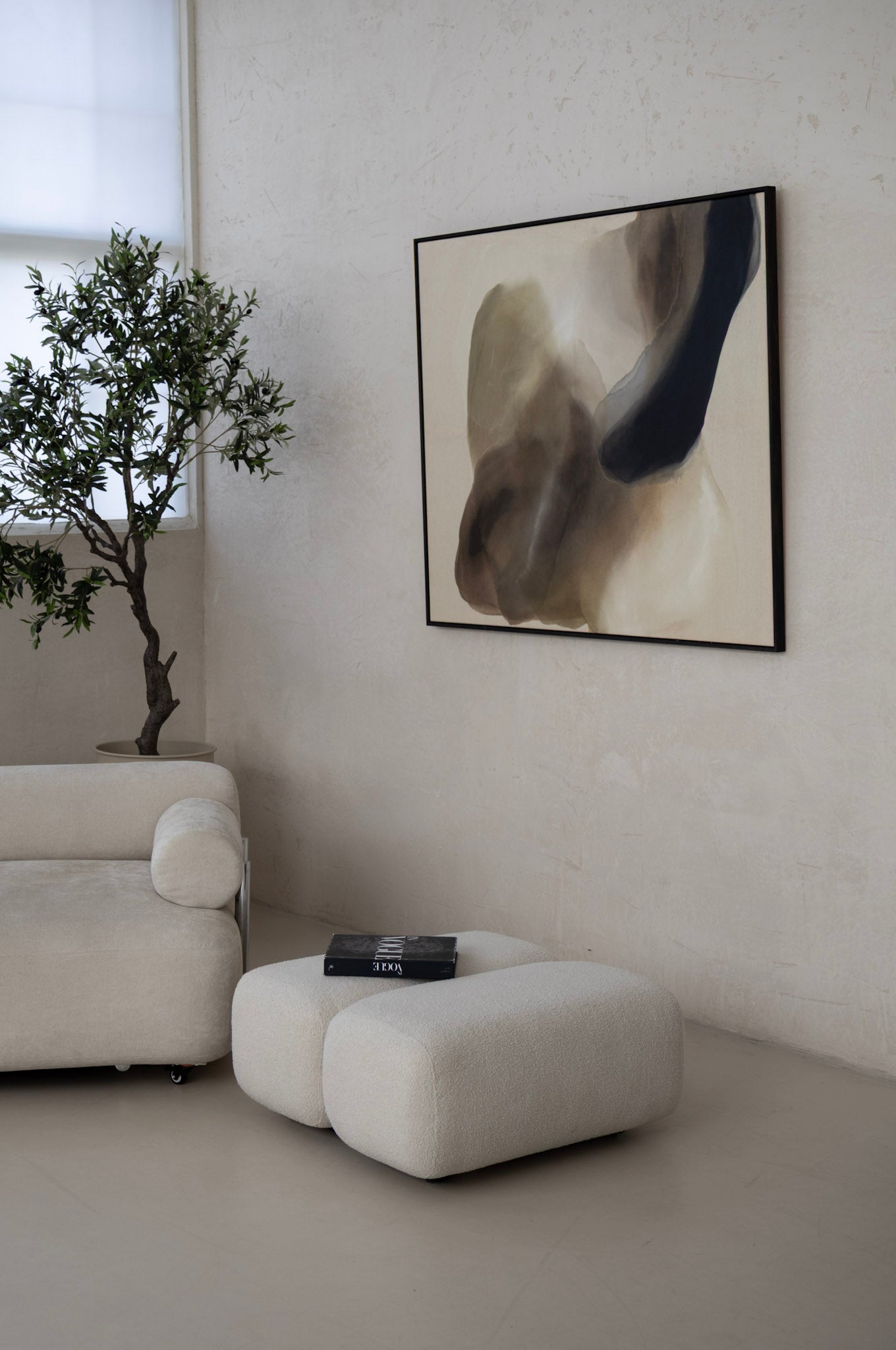 Large abstract artwork in earthy tones displayed above a sofa, 120 × 140 cm, framed in dark wood, Edge of Day by Liv Olsen.