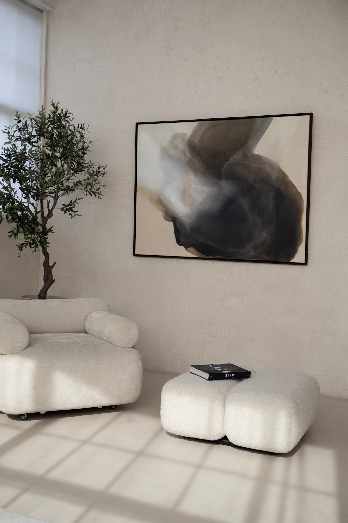 Large abstract painting “Becoming” in earthy tones displayed in a modern interior, 160 × 120 cm, framed in dark wood, Studio Liv Olsen.